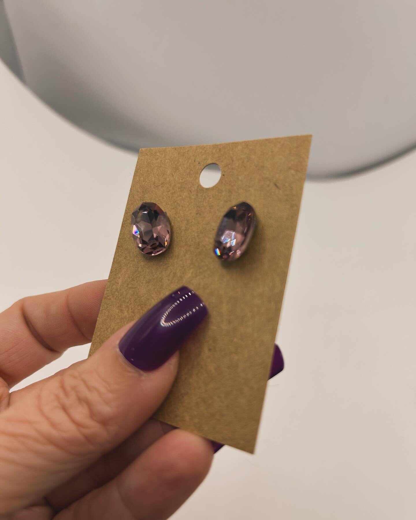 Pink oval studs