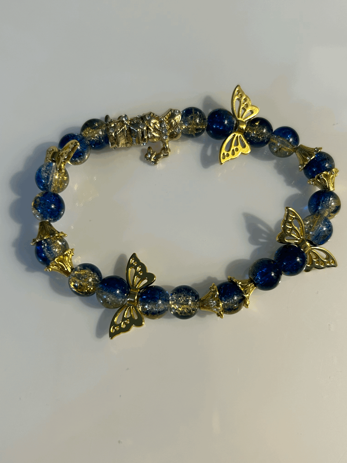 Blue and gold butterfly bracelet