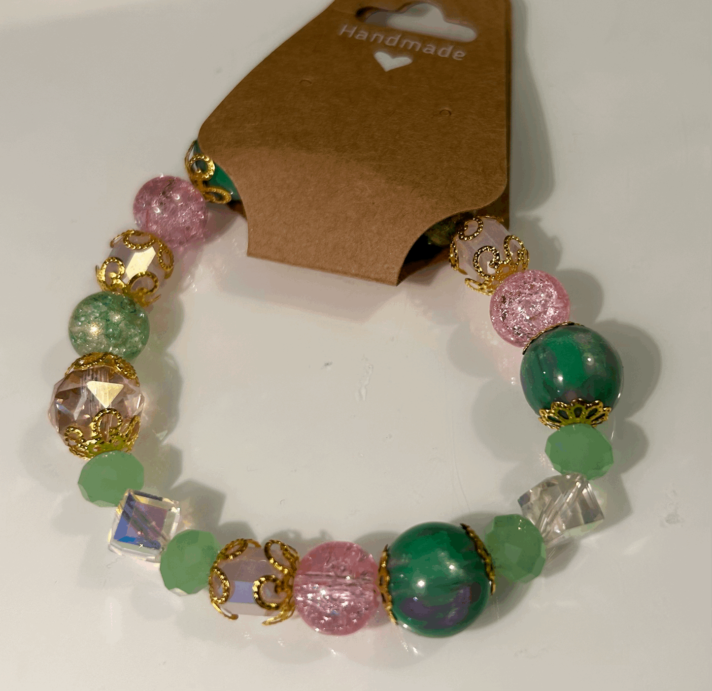 Pink and green glass bead bracelet