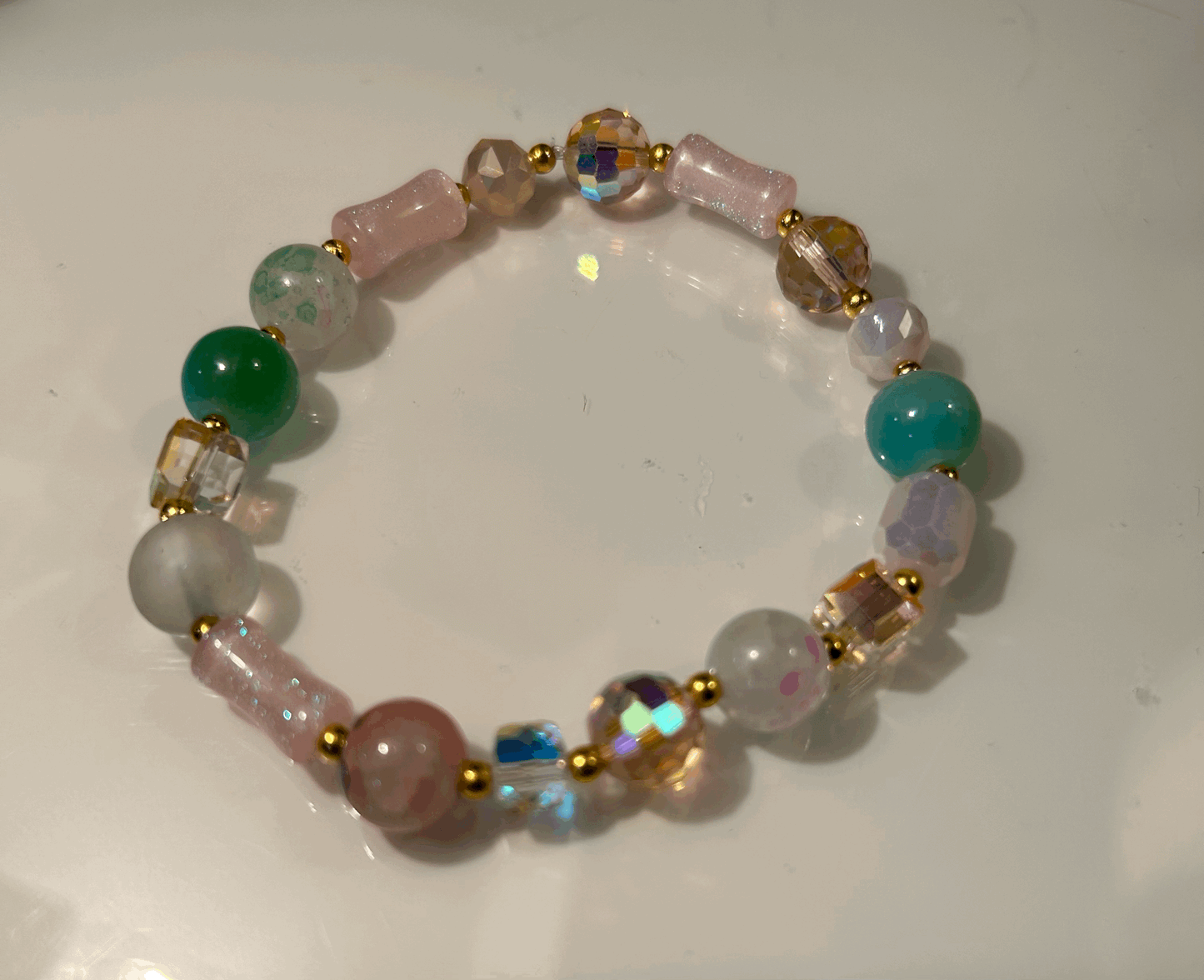 Pink and green glass bead bracelet