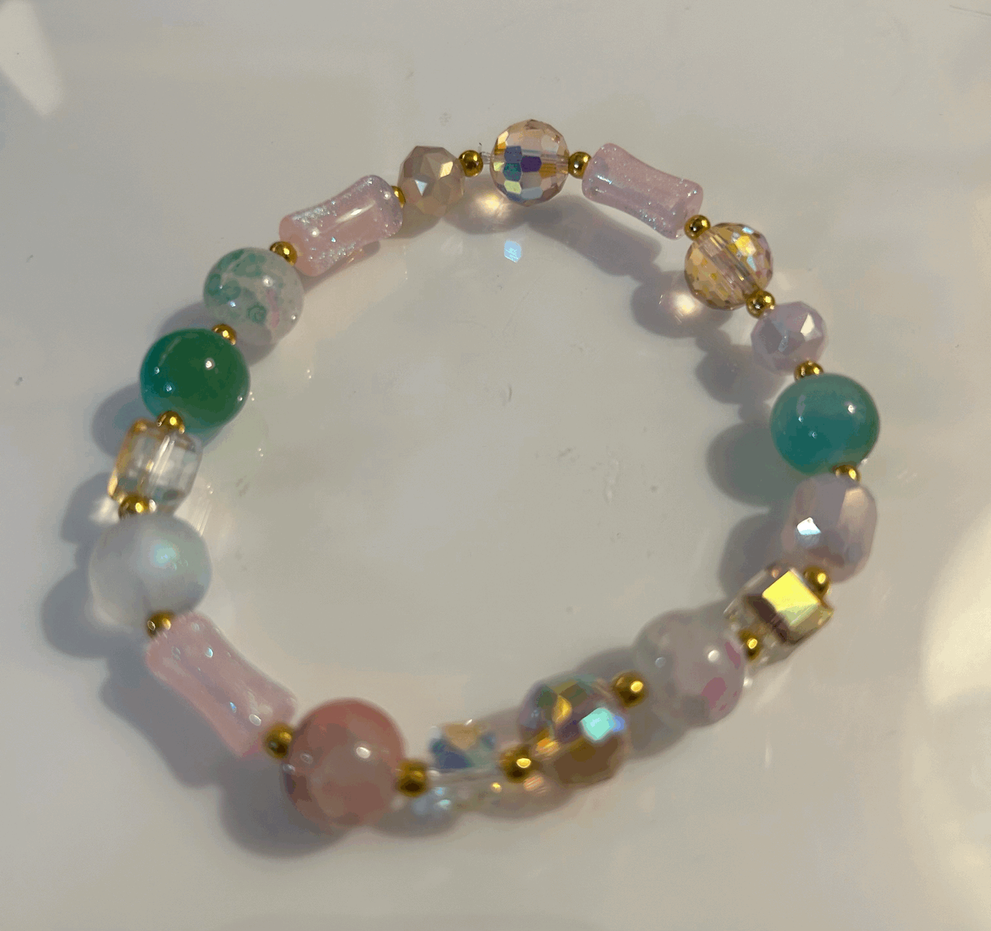 Pink and green glass bead bracelet