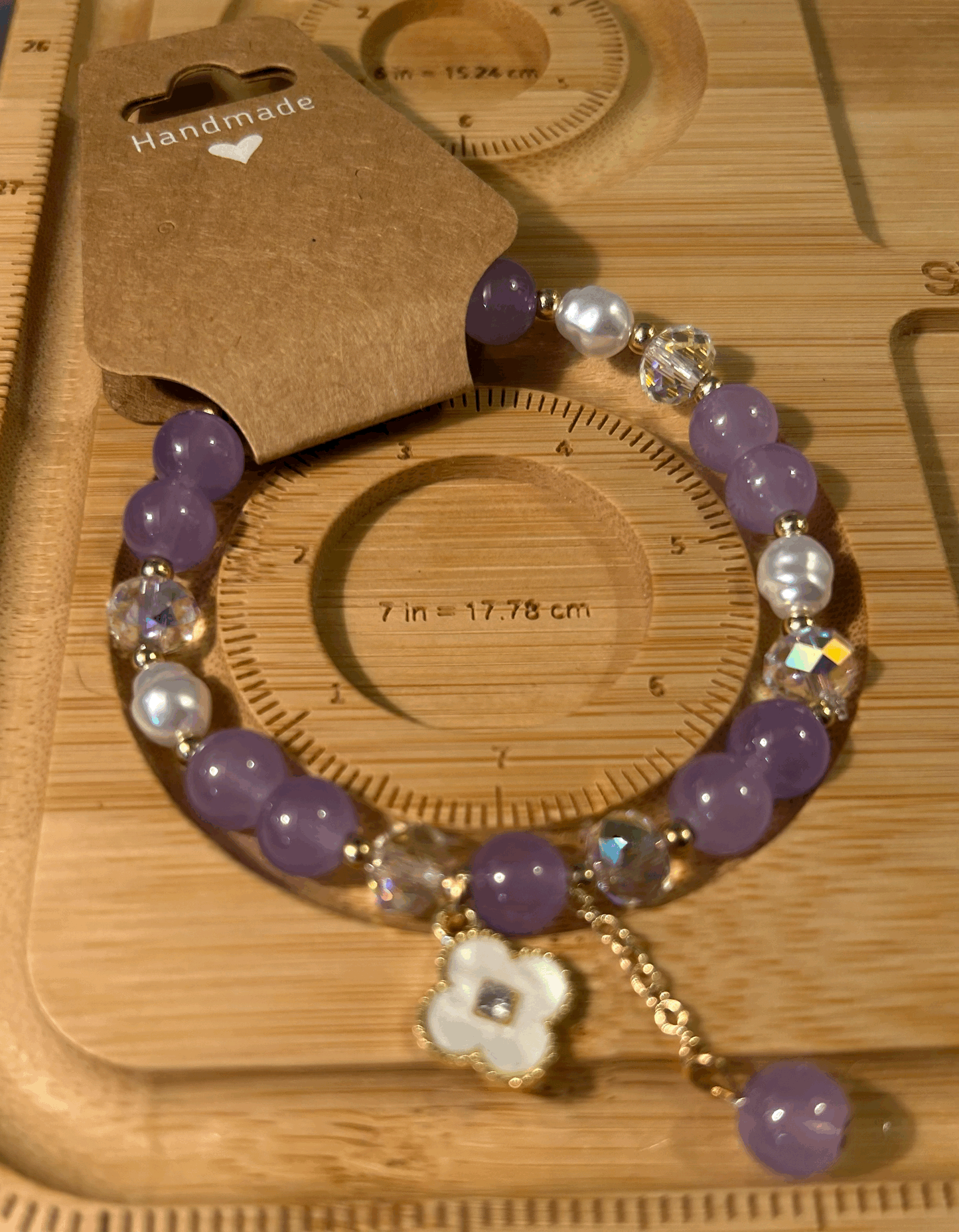 Purple and white flower bracelet