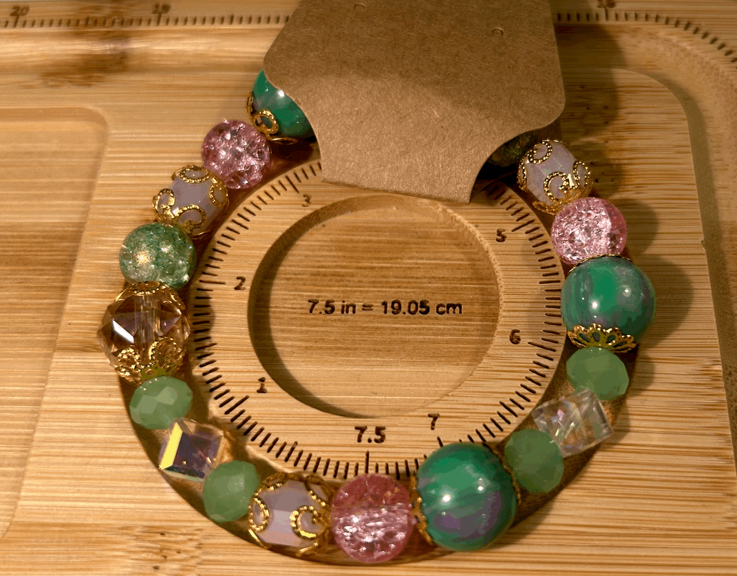 Pink and green glass bead bracelet